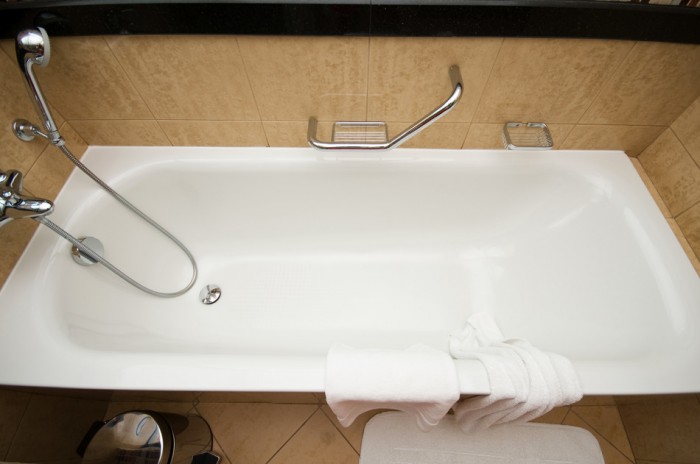 Bathtub and shower in the Bathroom.
