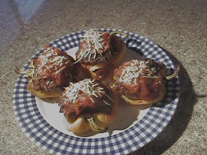 Italian Sausage Stuffed Bell Peppers with Basil, and Roasted Garlic. Italian Sausage Stuffed Bell Peppers with Basil, and Roasted Garlic.